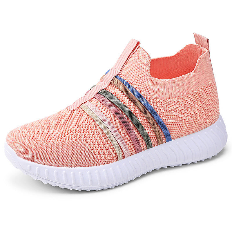 Pink sneaker with colorful stripes on a white background