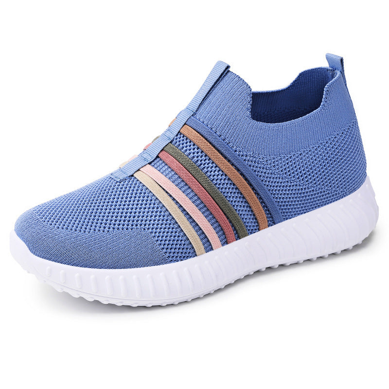 Blue slip-on sneaker with colorful stripes on a white background